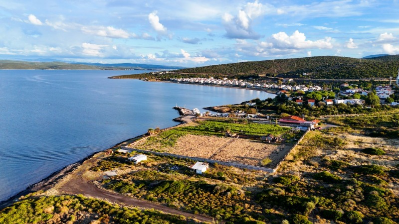 URLA GÜLBAHÇE’DE DENIZE SIFIR 6.079 M²  TURIZM IMARLI ARSA.